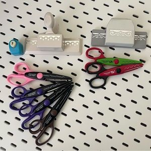 Assortment of paper edgers scissors presses punch